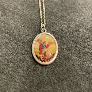 Religious “pray for us” pendant from Italy